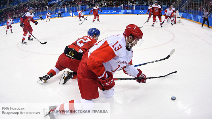 Олимпийских игр хоккей мужчины. Олимпийские игры с шайбой Россия. Хоккей защитники Отечества.